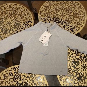 Tala Astor crops black and gray